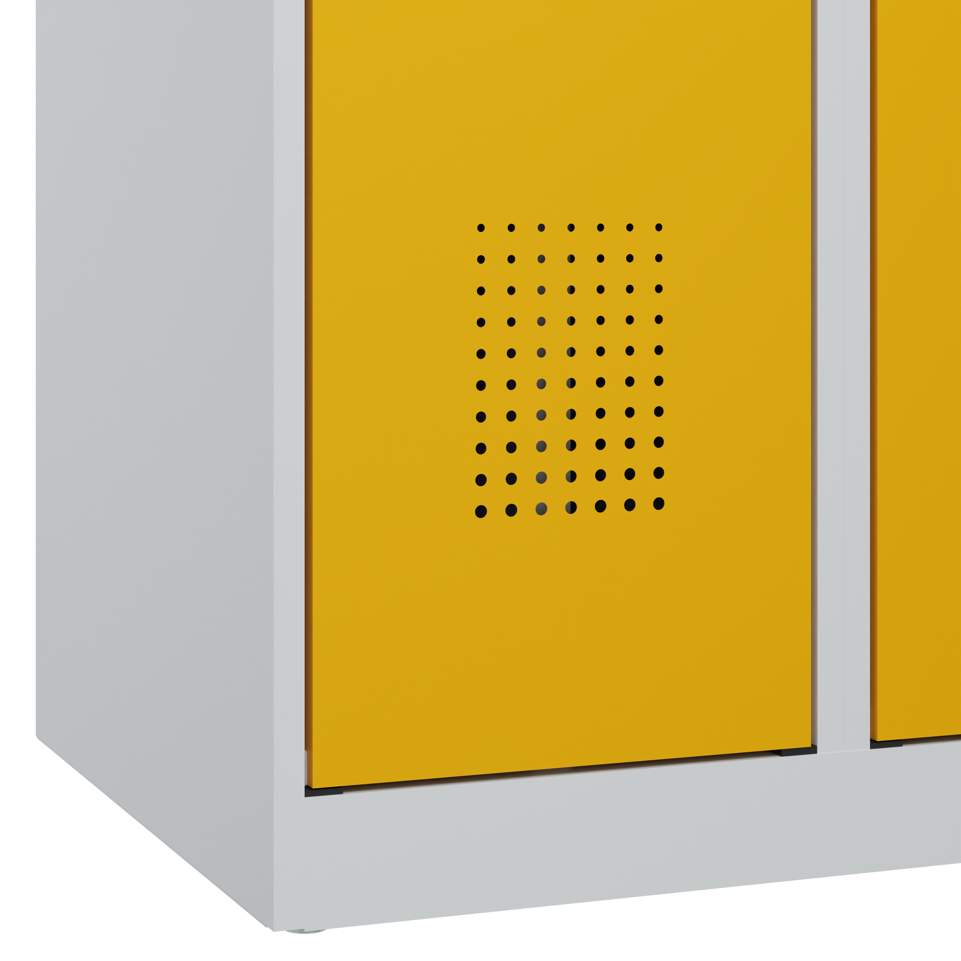 Gelber Spind mit Lüftungslöchern im weißen Rahmen, Nahaufnahme der Tür.