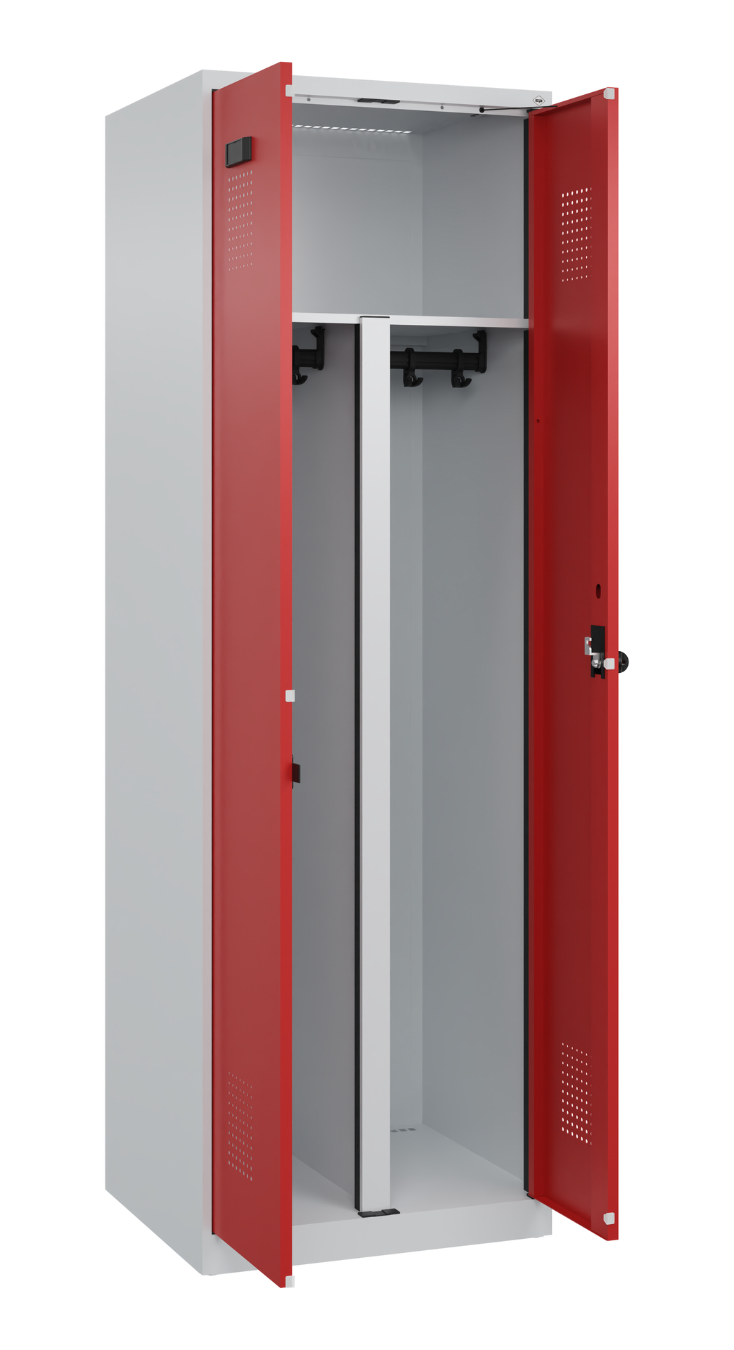 Offener Metallspind mit roten Türen in Innenraum.